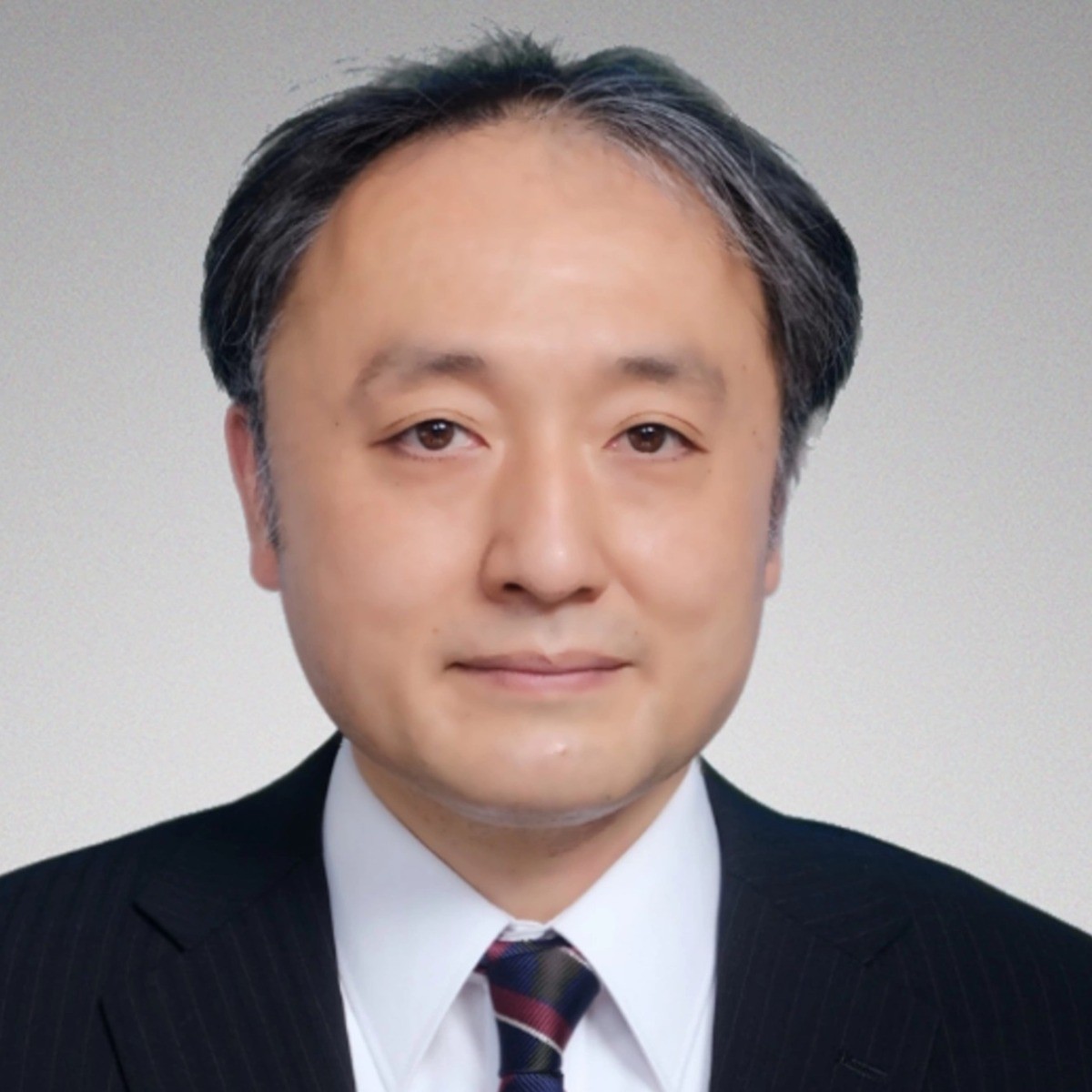 津田　明彦の顔写真